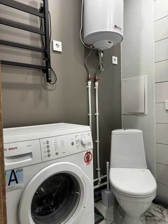 Современная квартира с шикарным видом на центр города и фонтаны