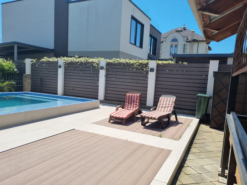 Коттедж Коттедж Апартаменты с бассейном — Сириус