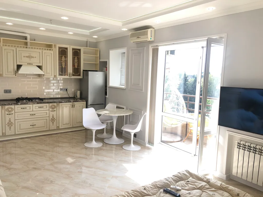 Студия в центре возле танка