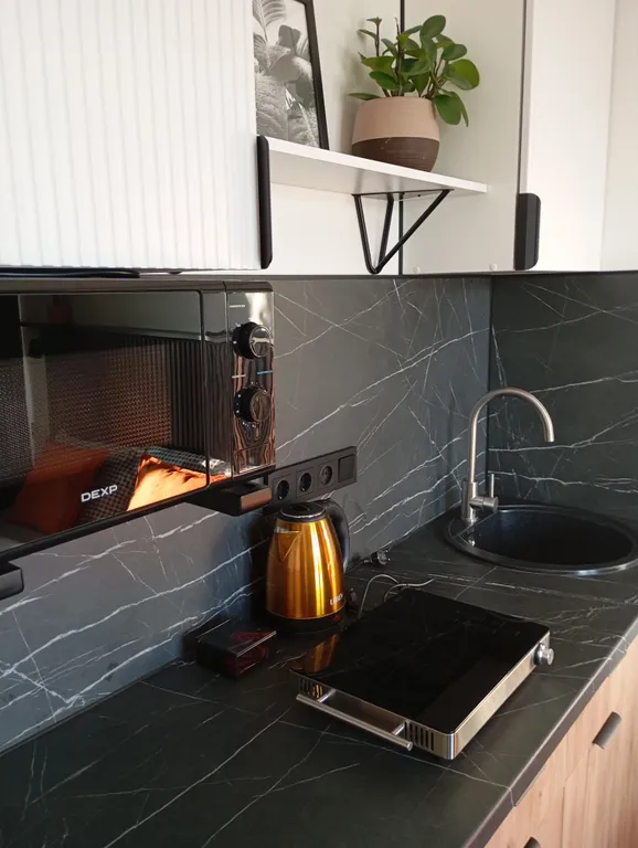 Уютная дизайнерская квартира-студия