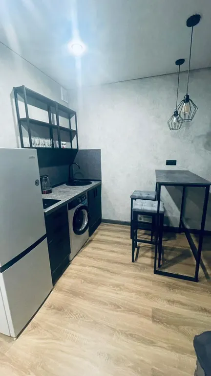 Студия в центре с видом на горы и парк