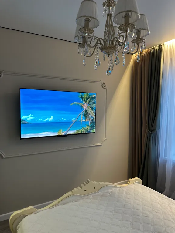 Уютная квартира в новом комплексе с дизайнерским ремонтом