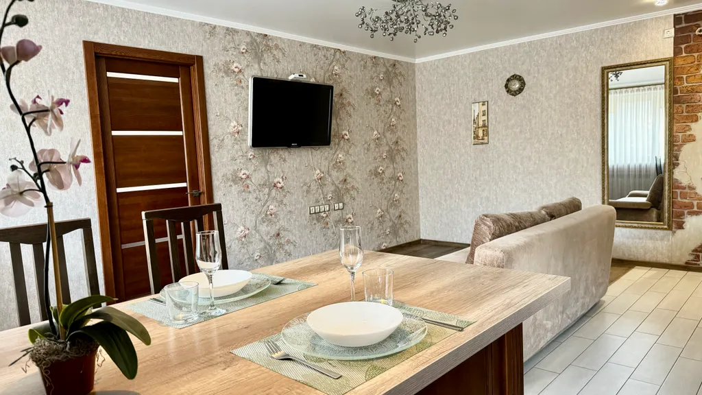 Двухкомнатная квартира в самом центре города с дизайнерским ремонтом