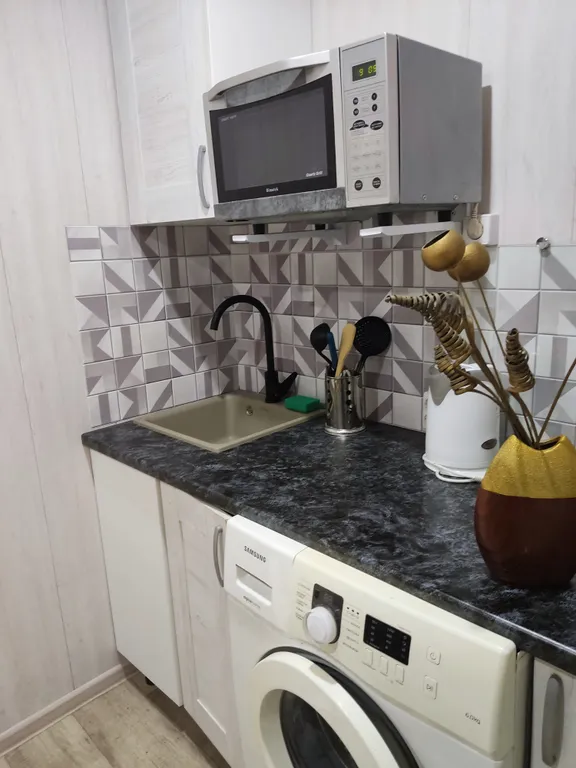 Уютная квартира у Галереи Чижова