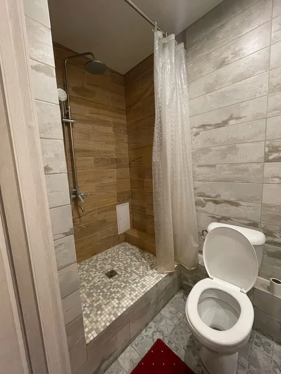 Уютная квартира студия в новом доме в центре города