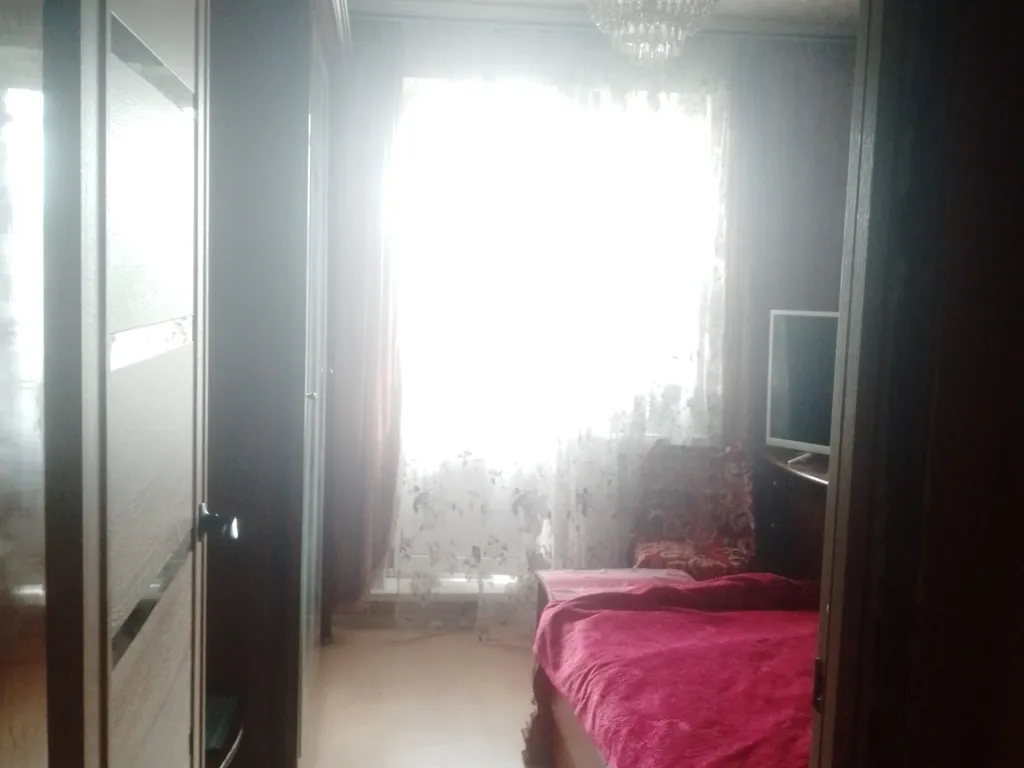 Уютная комната в трёхкомнатной квартире