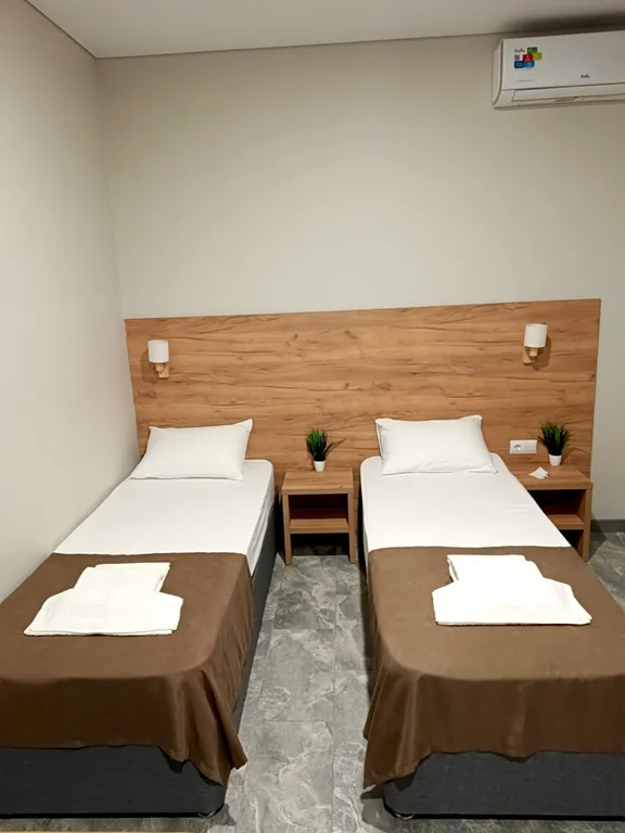 Трехместный номер с выходом во двор