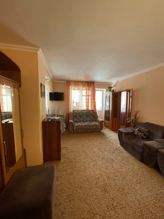 Уютная двухкомнатная квартира в центре Домбая