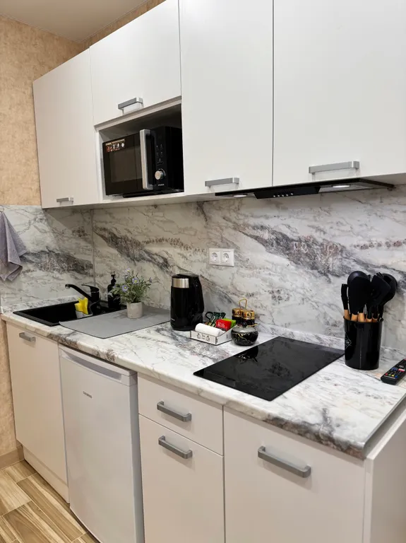 Современная студия в бежевых тонах в Люберцах