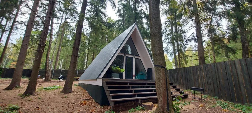 Дом Hamster в хвойном лесу у Большой воды