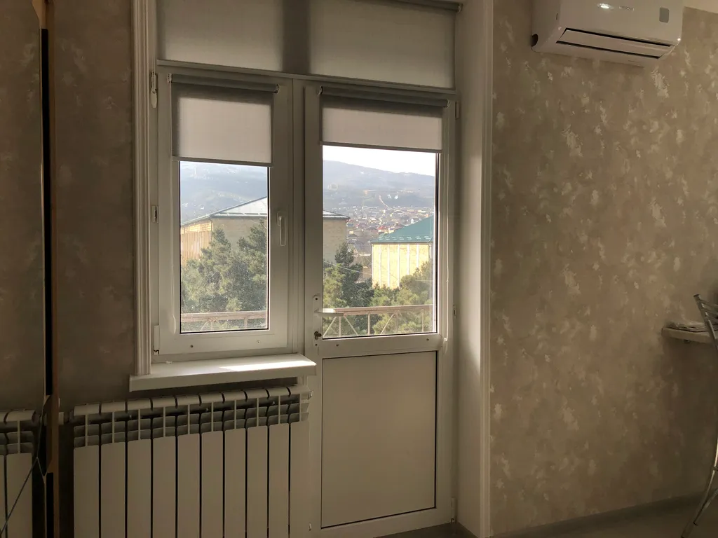 Уютная квартира с красивым видом на крепость и горы в центре города