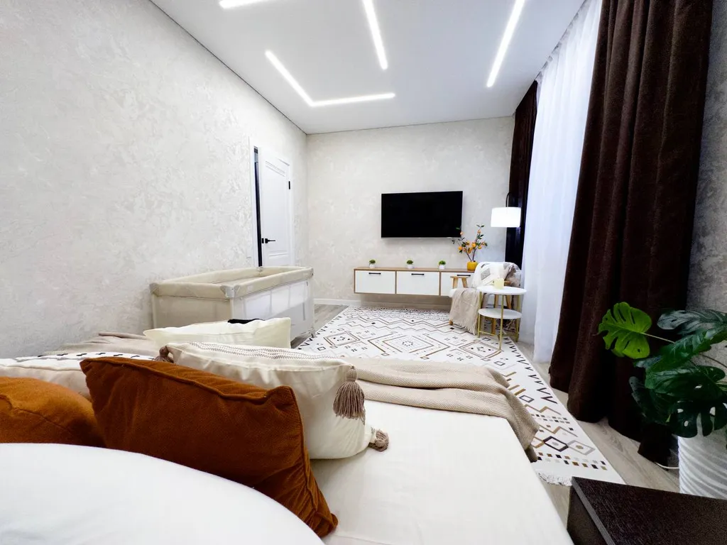 Уютная квартира с большим ТВ