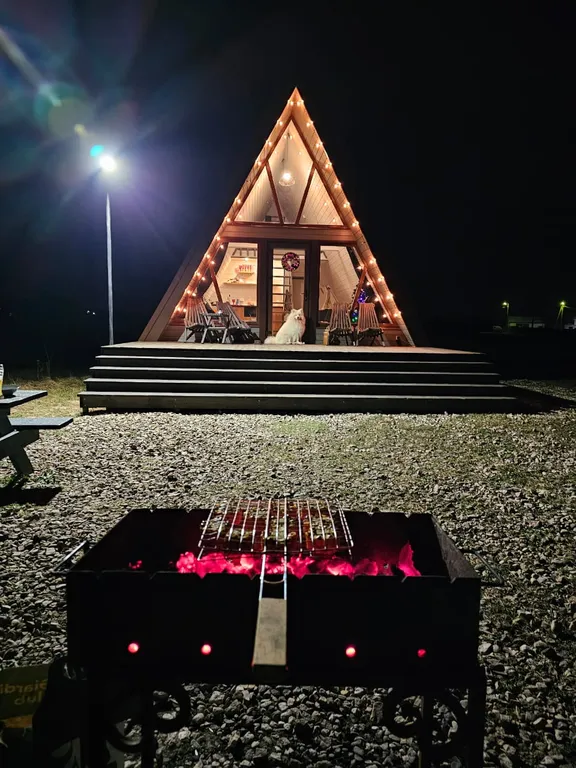 Треугольный дом