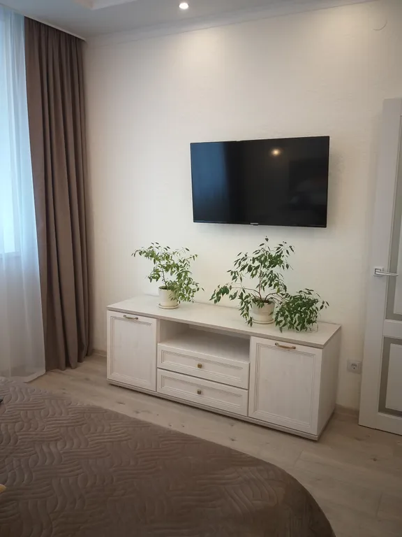 Уютная квартира в живописном районе рядом с ФОК