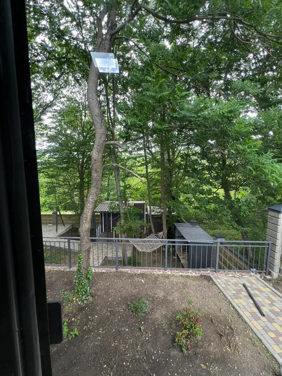 Домик в лесу с большой верандой