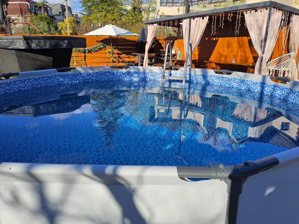 Дом а-фрейм с банным чаном, бассейном, беседкой, парковкой в Сочи