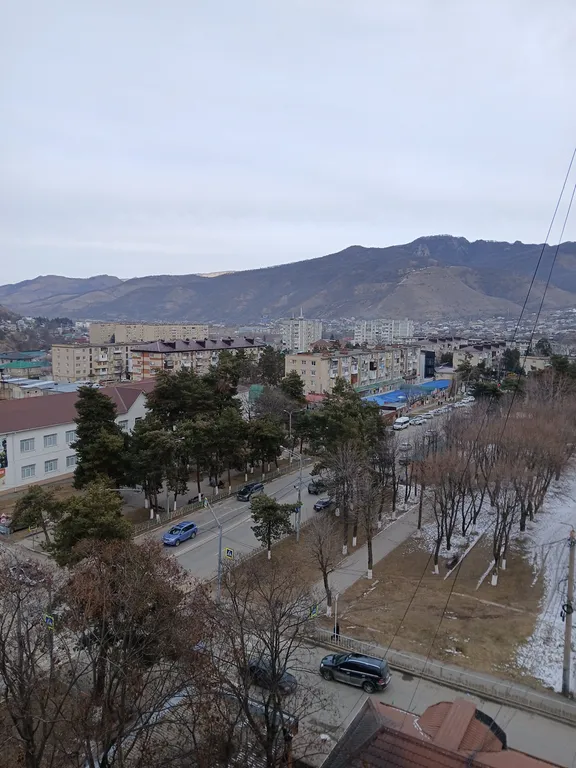 "Квартира в центре города с видом на горы"