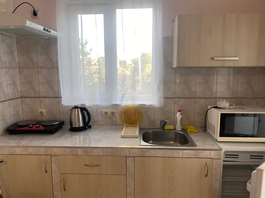 Квартира Уютная комната-студия с видом на сад — Севастополь