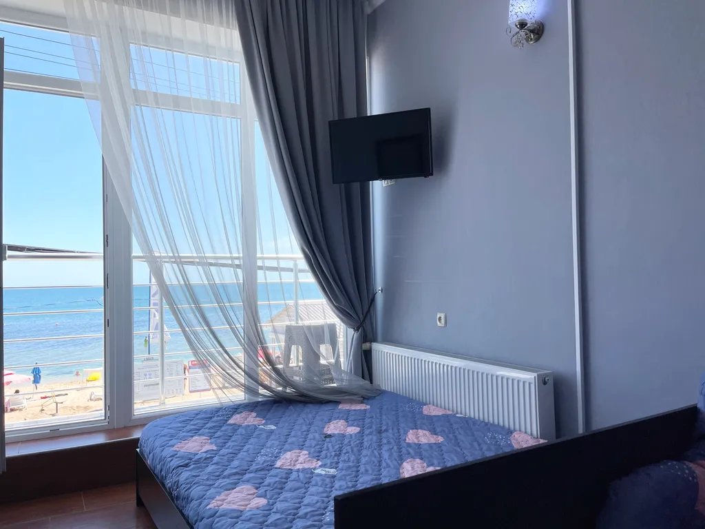 Апартаменты с видом на море с балконом.