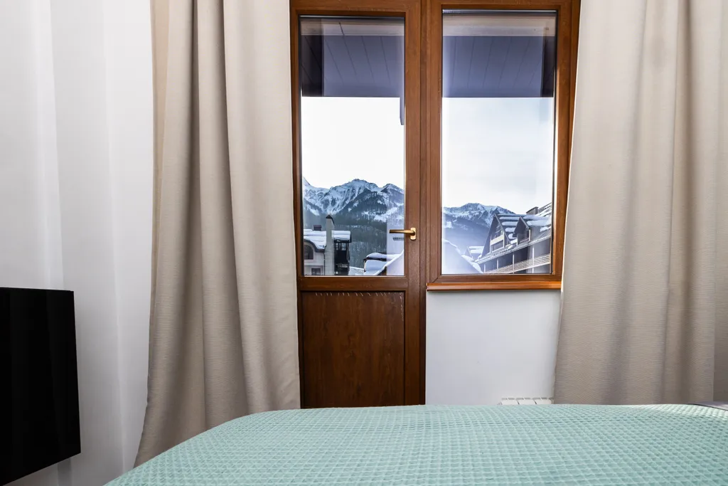 Современные дизайнерские апартаменты с потрясающим видом на горы