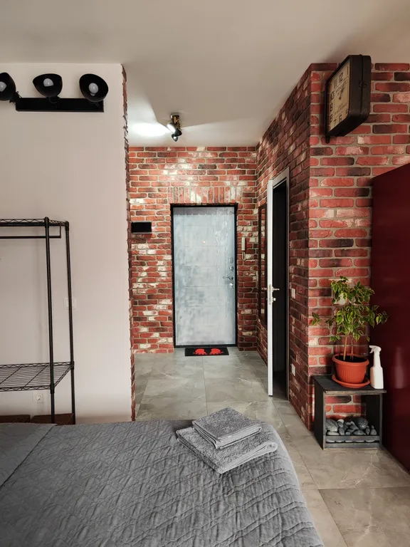 Уютная квартира-студия в стиле лофт в тихом районе