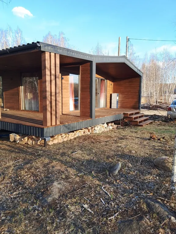 Дом в лесу на берегу озера Увильды