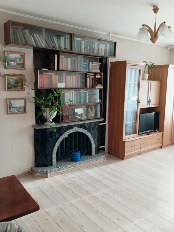 Скромная квартира с изолированными комнатами в центре