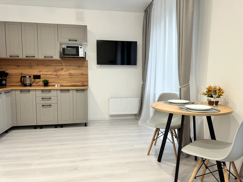 Уютная квартира в центре города, с красивым видом на озеро и двор