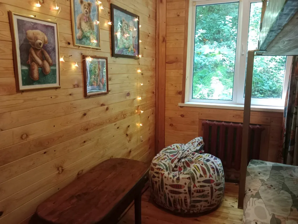 Домик с верандой в лесу