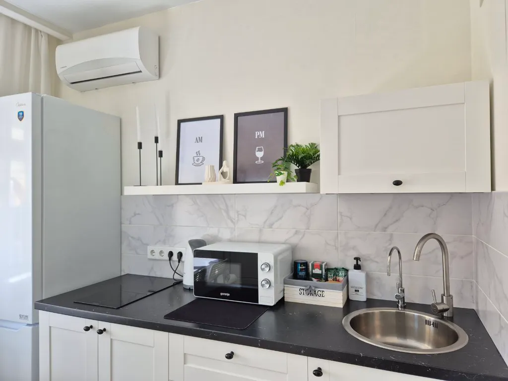 Уютная квартира Diamond в новом доме в центре города.