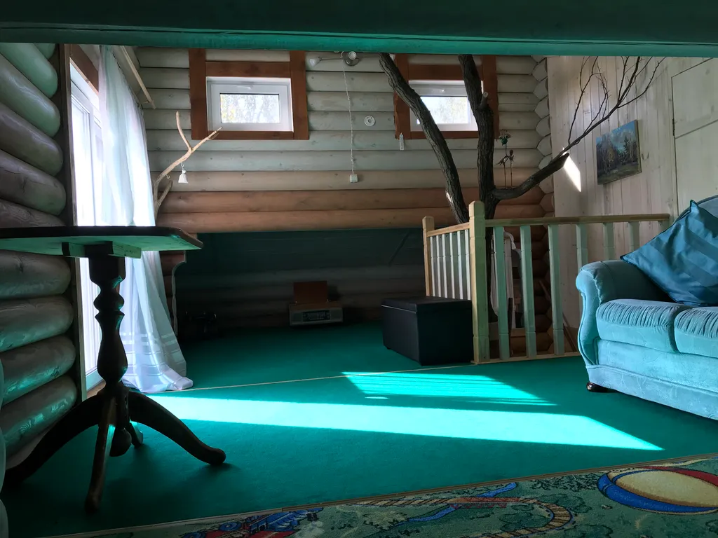 Дом из бревна Терем с сауной в черте города