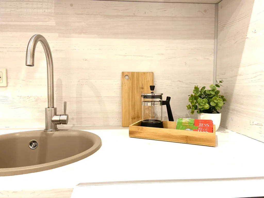 Современная квартира в центре в новом доме с частной парковкой