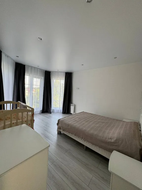 Уютный дом с панорамными окнами