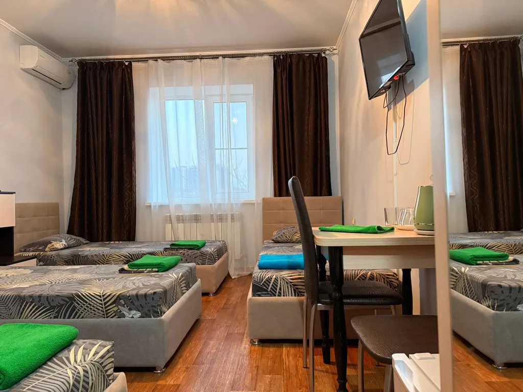 Четырехместный номер с 4-мя односпальными кроватями