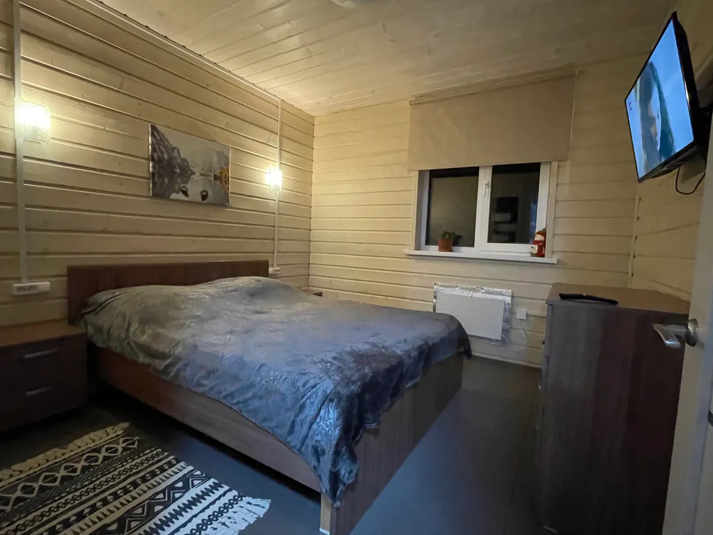 Коттедж Уютный дом с баней и видом на озеро Врево — Луга