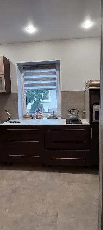 Уютный дом в черте города для комфортного отдыха в лесной местности