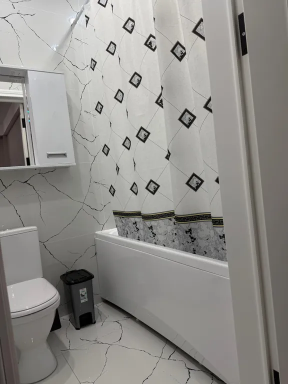 Уютная квартира в центре города рядом с фонтаном, с видом на город