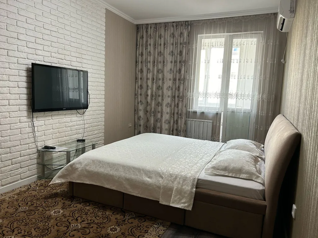 Уютная квартира напротив Алматы Арены