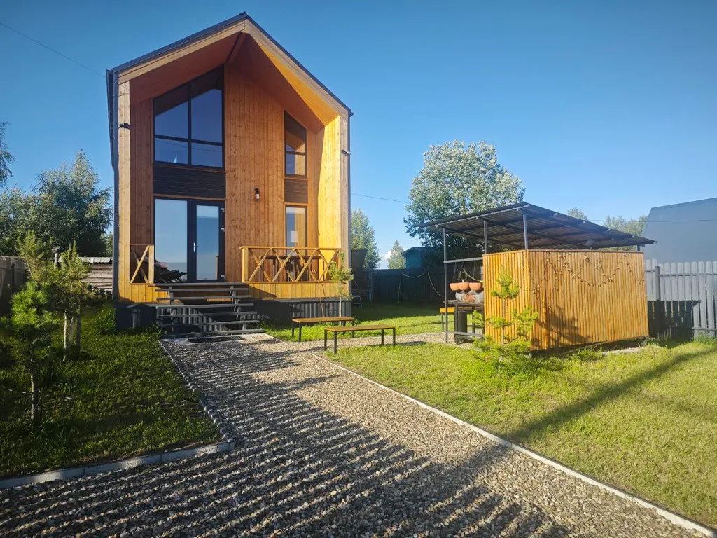 Коттедж с сауной для семейного отдыха в стиле барнхаус