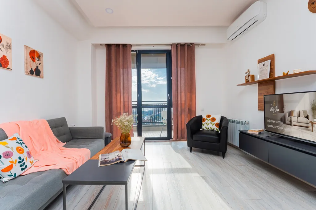 Стильная квартира с прекрасным видом в центре города / Стей Инн