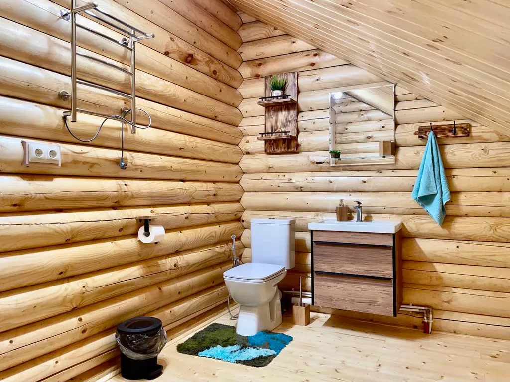 Бревенчатый 2-х этажный коттедж