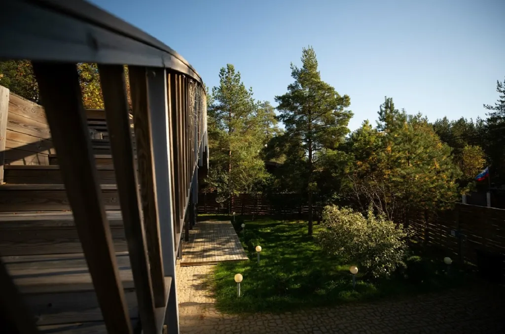 Дизайнерский коттедж с садом на крыше