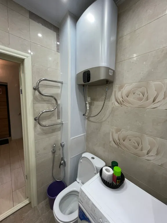 Крупногабаритная студия с высокими потолками в элитном доме