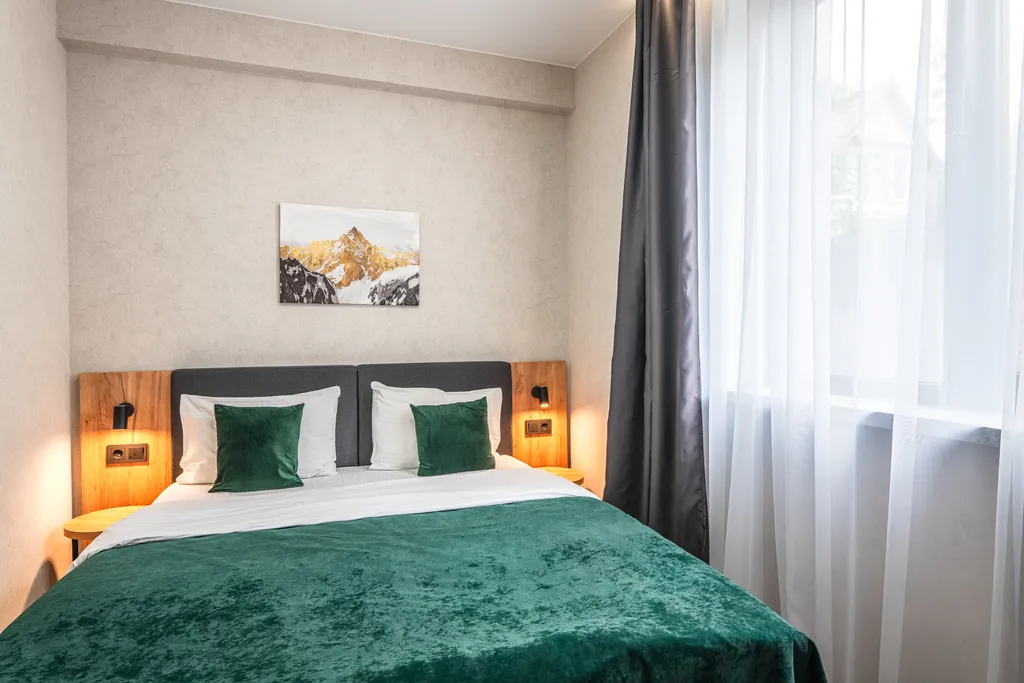 Апартаменты с отдельной спальней в центре Красной Поляны