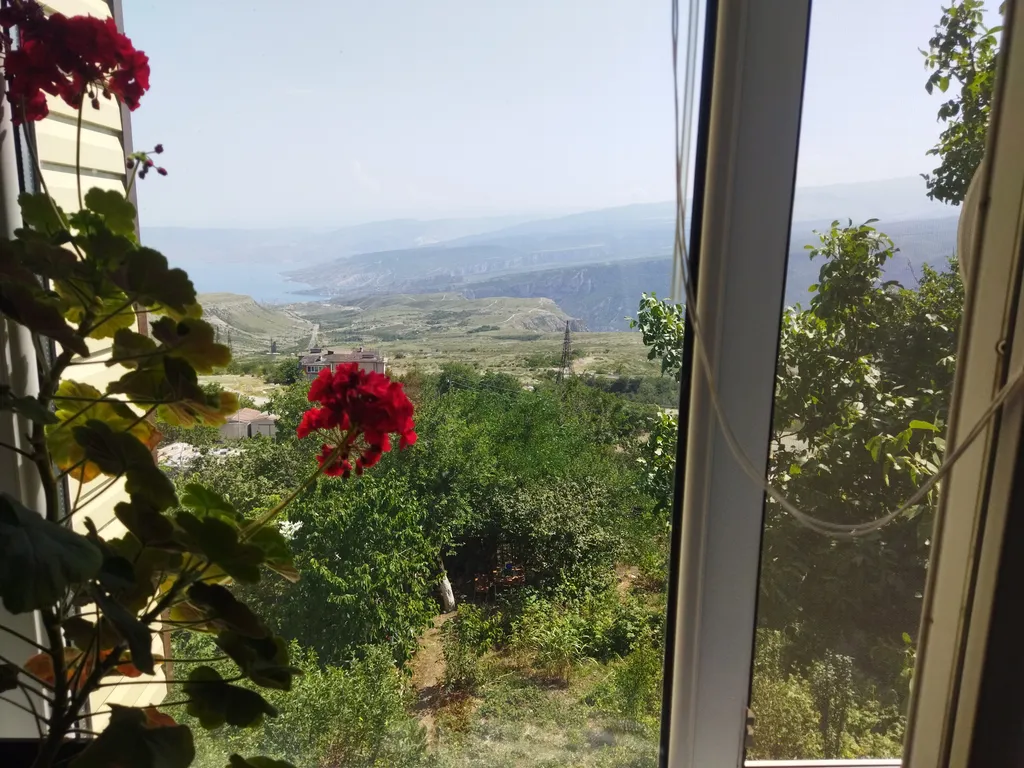 Уютная квартира с прекрасным видом на водохранилище и горы