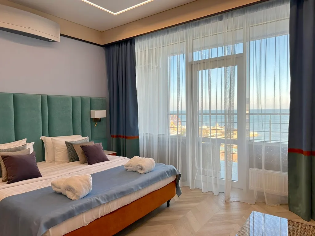 Апартаменты Акваделюкс с шикарным видом на море и большим балконом