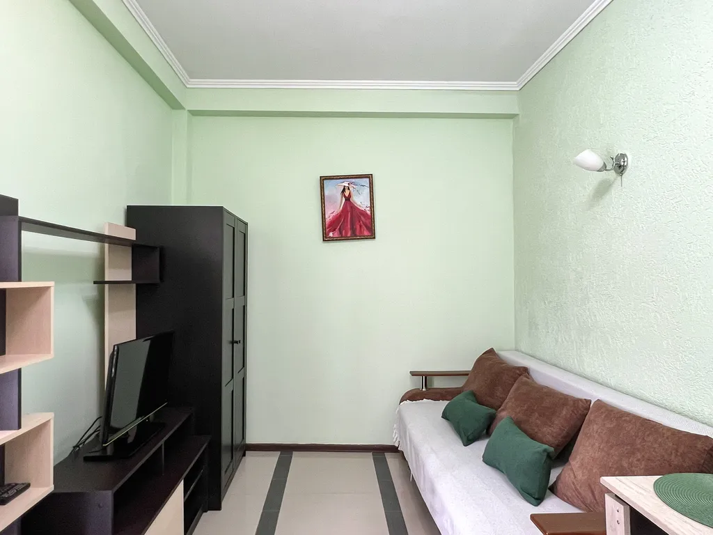 Семейный номер с кухней в центре