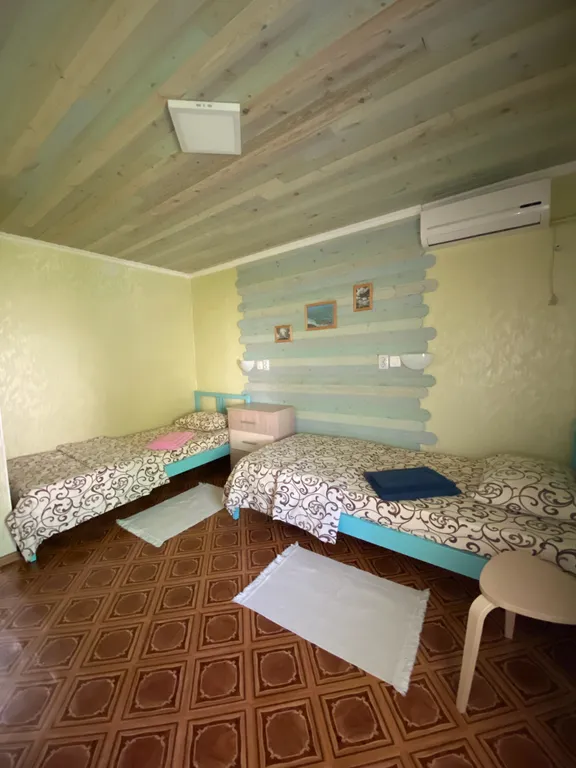 Четырехместный двухкомнатный номер с балконом с видом на горы