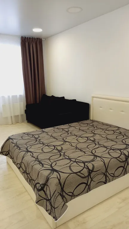 Просторная студия с видом на город