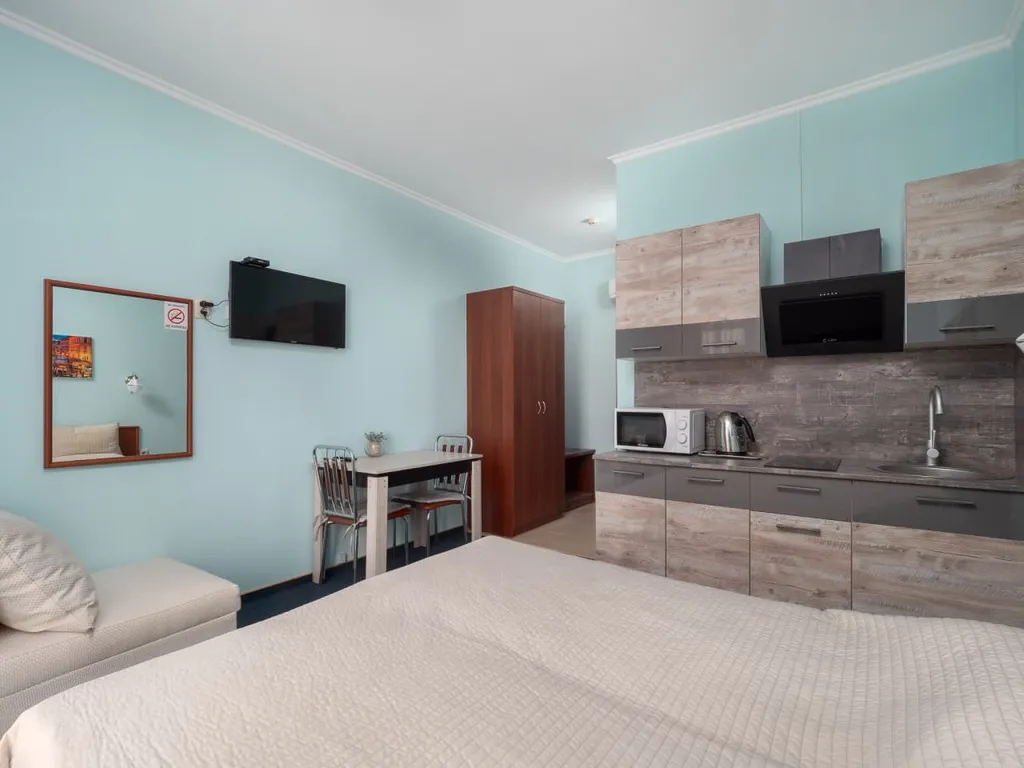 Квартира Квартира Уютная студия у моря с теплым бассейном — Сириус